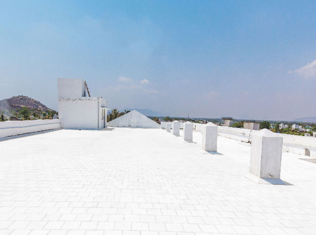 Heat reflective tiles